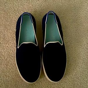 Rothy’s slip on sneakers in navy blue.  Good condition, super cute!